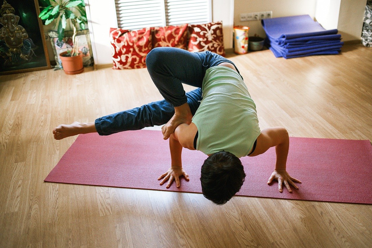 Beginner practicing a gentle yoga pose during a yoga for beginners session